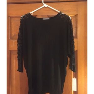 Black, mid length lace sleeves top